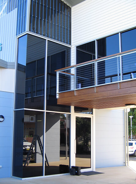 Two storey office block with glass windows